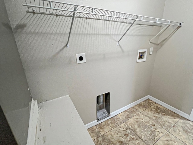 laundry room featuring hookup for an electric dryer, washer hookup, and tile patterned floors