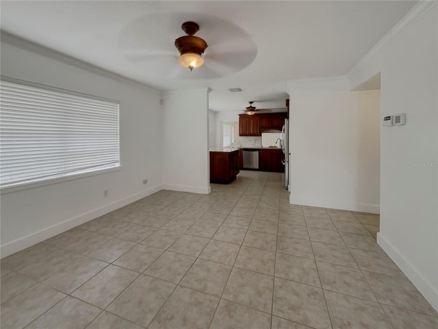 unfurnished living room with ceiling fan, light tile patterned flooring, and ornamental molding