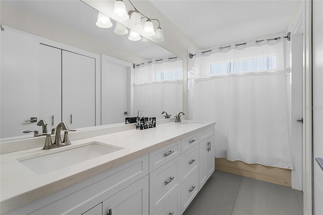 bathroom featuring tile patterned floors, vanity, and shower / tub combo with curtain