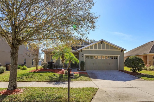 view of front facade with a front lawn and a garage