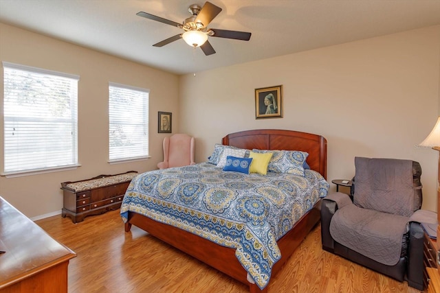 bedroom featuring ceiling fan and light wood-type flooring