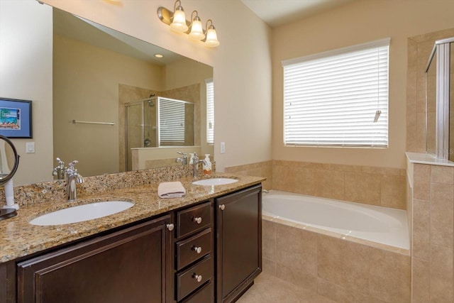 bathroom featuring vanity and plus walk in shower