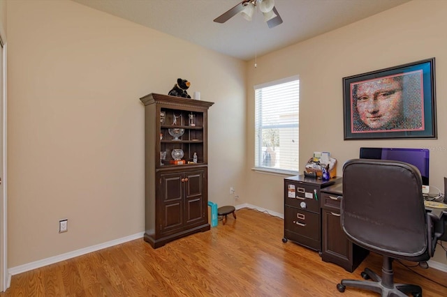 office area with ceiling fan and light wood-type flooring