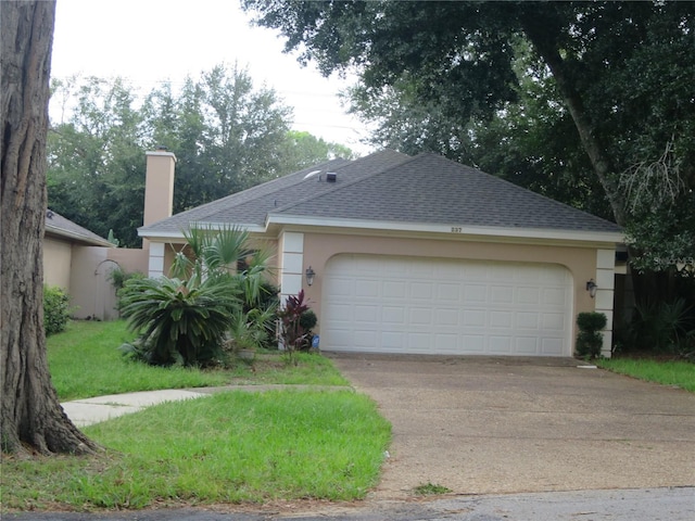 ranch-style house featuring a garage