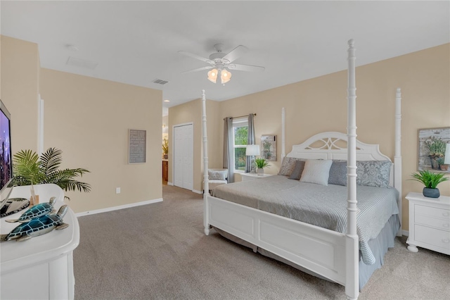 carpeted bedroom with ceiling fan