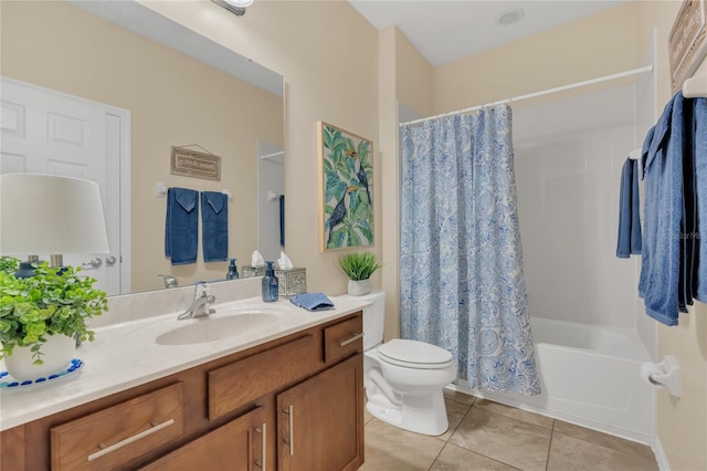 full bathroom with shower / tub combo with curtain, tile patterned floors, toilet, and vanity