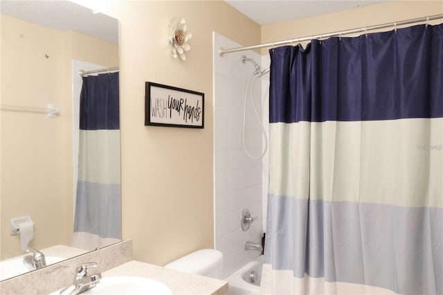 full bathroom with shower / bath combination with curtain, toilet, and vanity