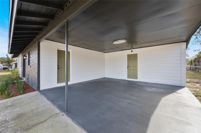 view of patio featuring a carport