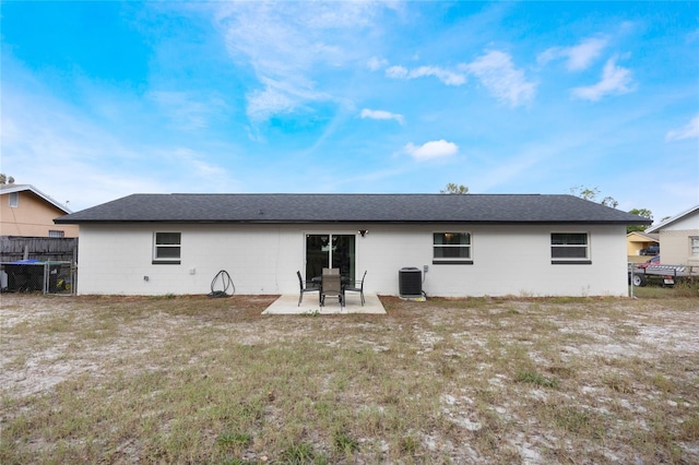 back of property featuring a patio area and central air condition unit