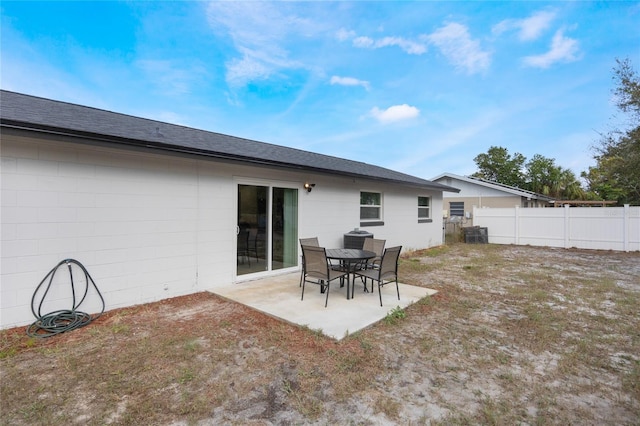 rear view of property featuring a patio