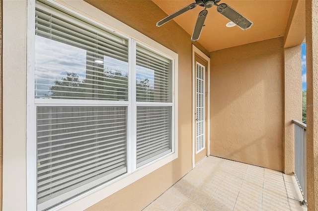 balcony featuring ceiling fan