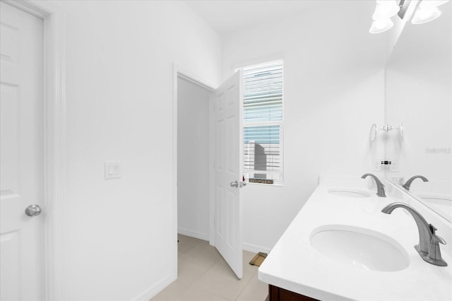 bathroom with vanity and tile patterned floors