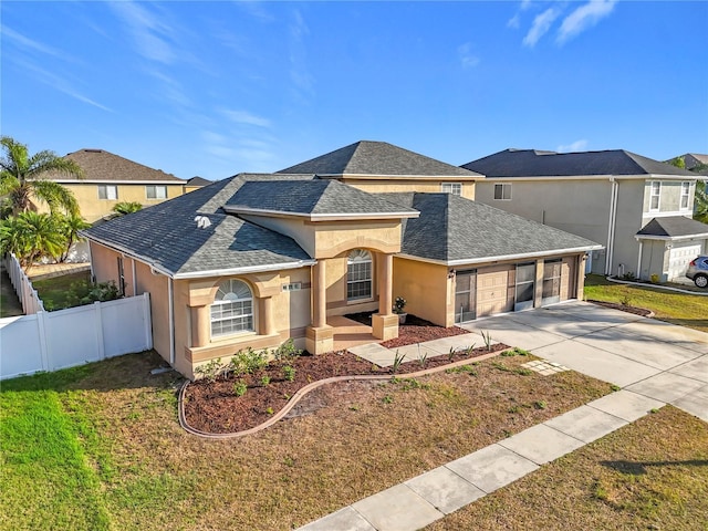 view of front of home with a garage