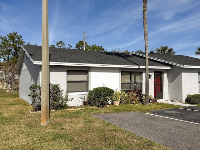 view of front of home with a front yard