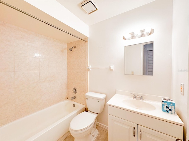 full bathroom featuring vanity, toilet, and tiled shower / bath combo