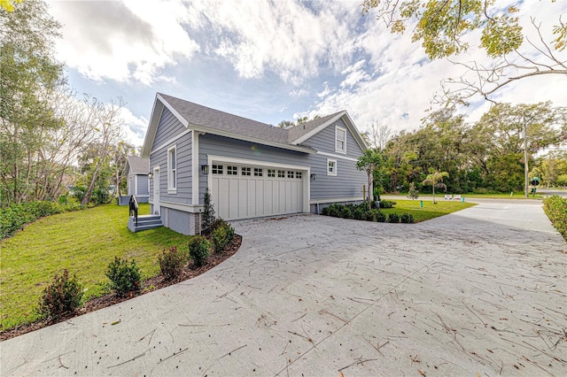 view of side of home featuring a lawn