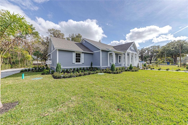 view of front of house with a front lawn