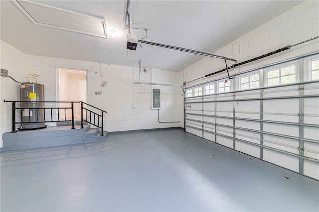 garage featuring electric panel, a garage door opener, and water heater