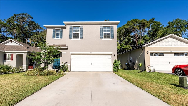 view of front of property featuring a garage and a front lawn