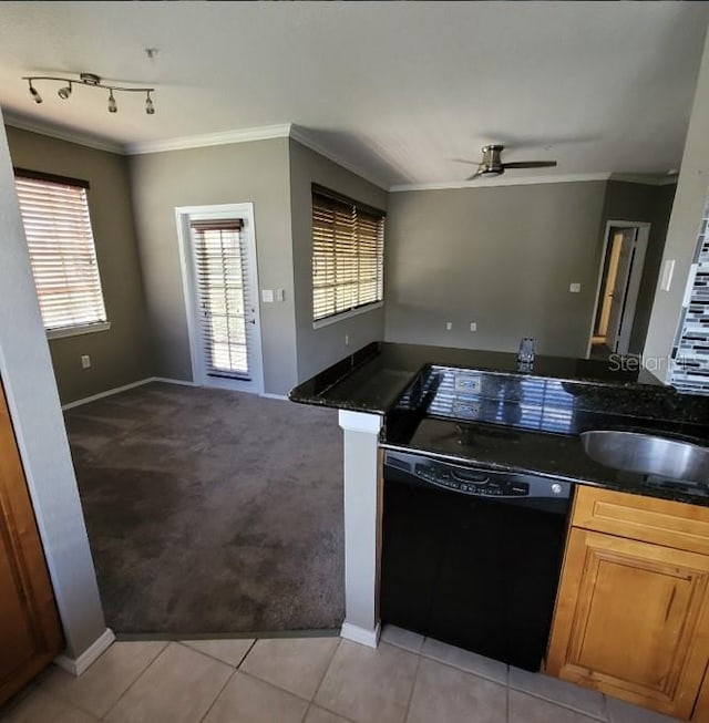 kitchen with dishwasher, light carpet, sink, ceiling fan, and ornamental molding