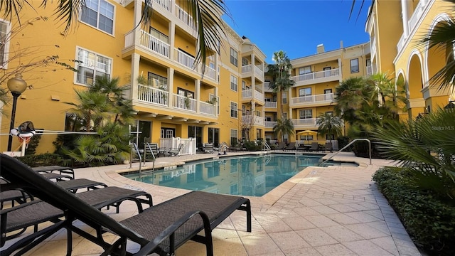 view of pool featuring a patio area