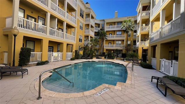 view of pool featuring a patio area