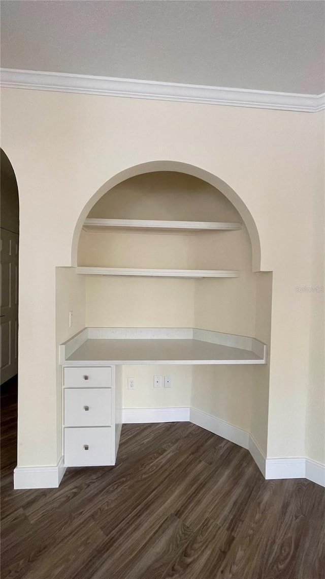 room details featuring hardwood / wood-style floors and crown molding