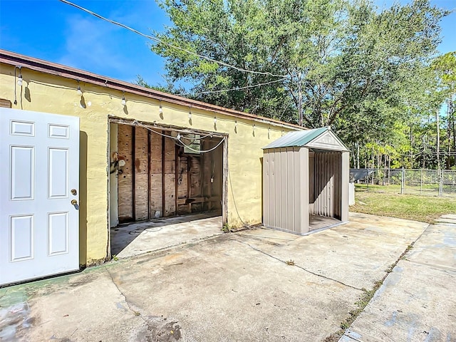 exterior space featuring an outbuilding