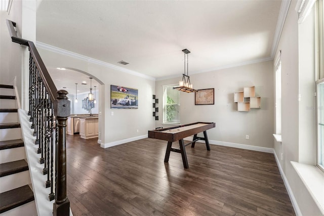 recreation room with crown molding, dark hardwood / wood-style flooring, and billiards