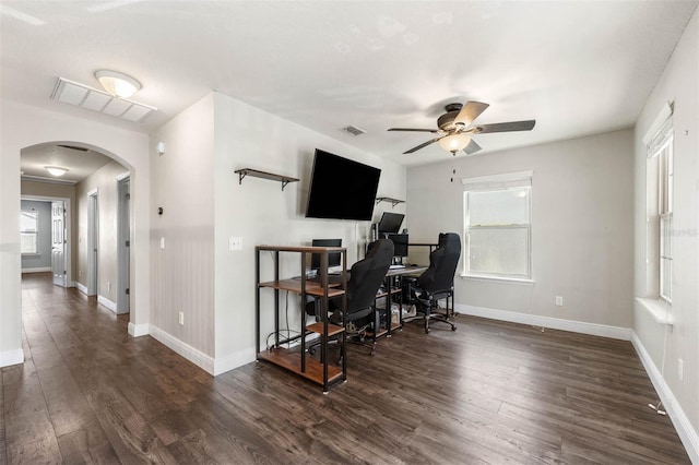 office space featuring dark hardwood / wood-style flooring and ceiling fan