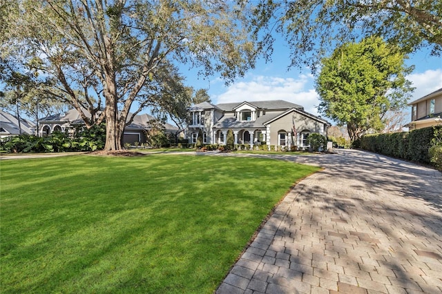 view of front of home featuring a front lawn