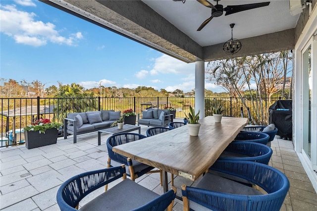 view of patio / terrace featuring an outdoor hangout area, ceiling fan, and grilling area