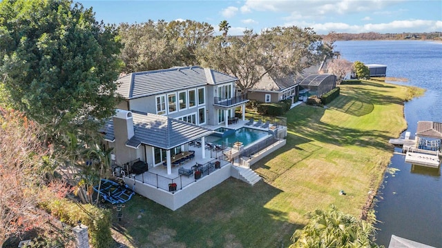 drone / aerial view featuring a water view