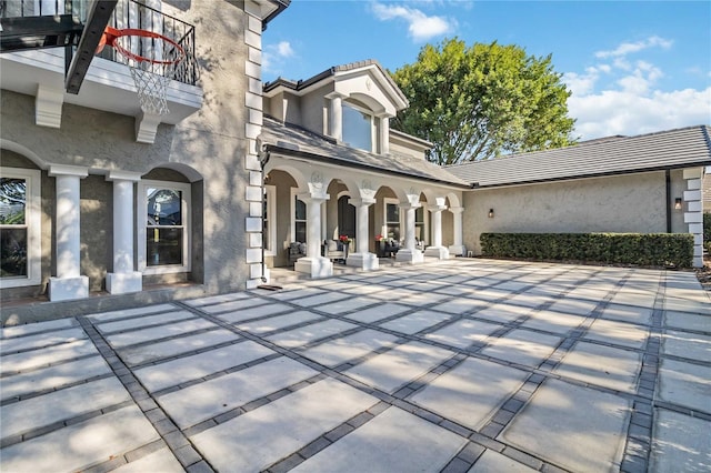 exterior space with a balcony