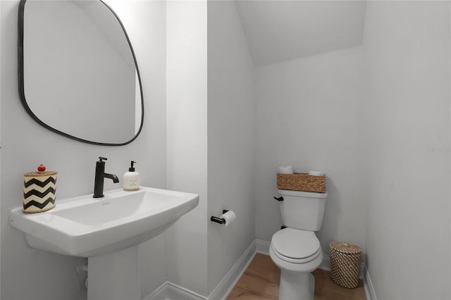 bathroom with toilet and sink