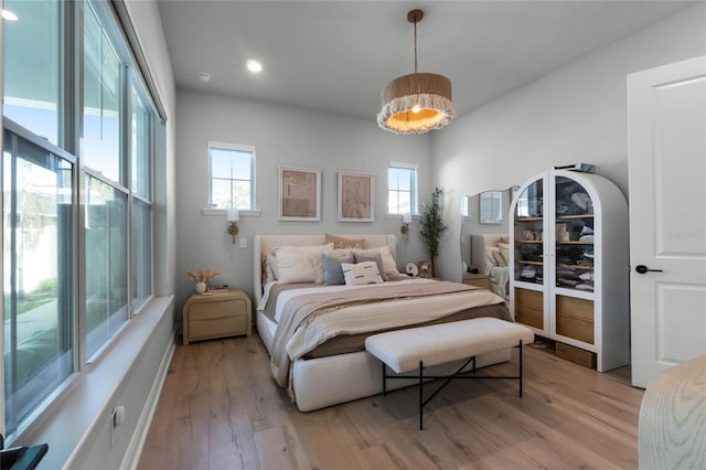 bedroom featuring light wood-type flooring