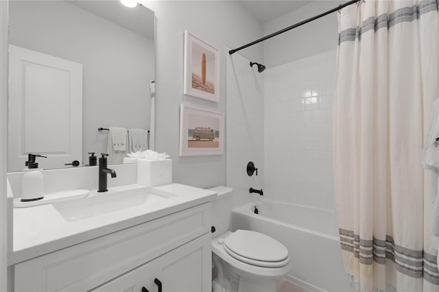 full bathroom featuring vanity, shower / bathtub combination with curtain, and toilet