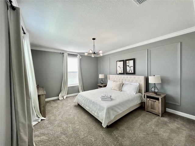 carpeted bedroom with crown molding, a textured ceiling, and a notable chandelier