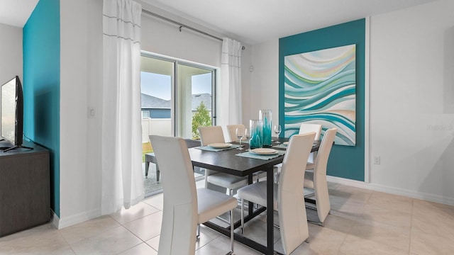 dining area with light tile patterned flooring