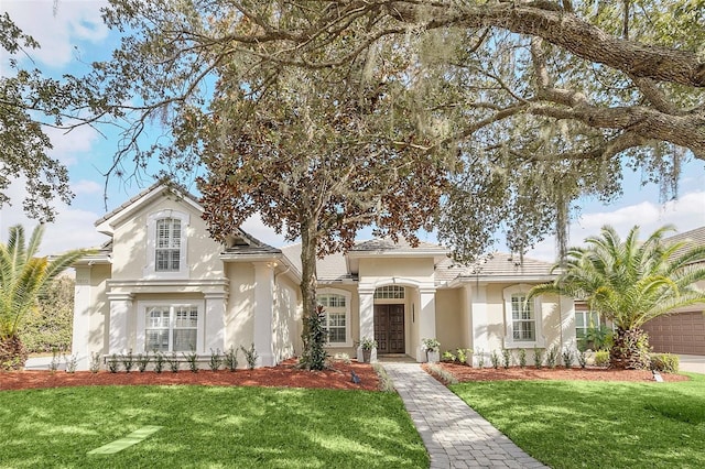 view of front of home with a front yard