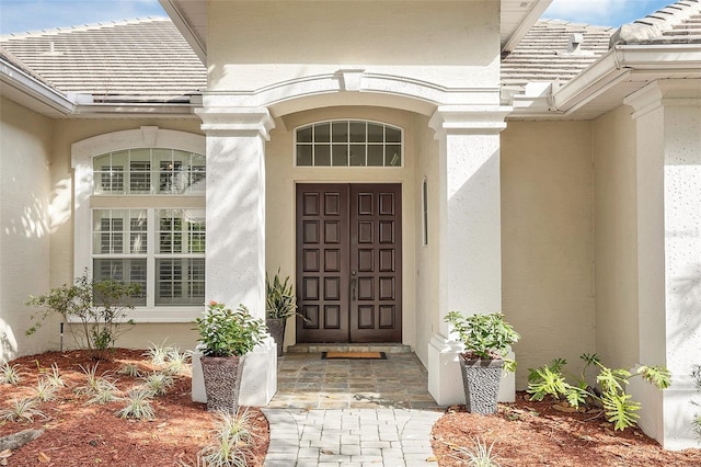 1610 Conway Isle Cir, Belle Isle, FL 32809 - entrance to property with stucco siding and a tiled roof
