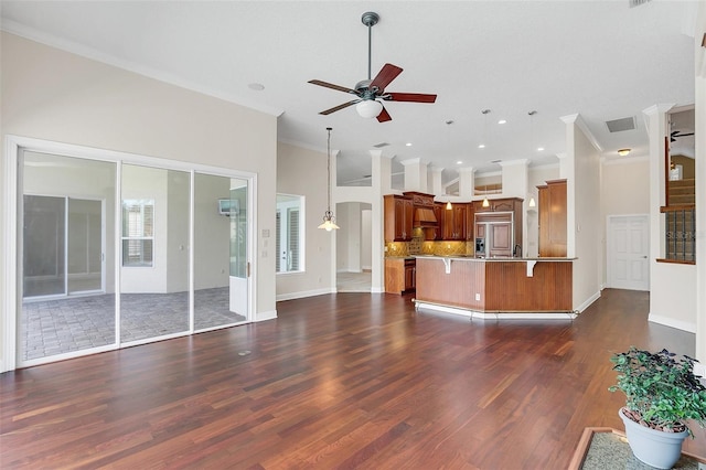 1610 Conway Isle Cir, Belle Isle, FL 32809 - unfurnished living room with ornamental molding, ceiling fan, dark wood-style flooring, and recessed lighting
