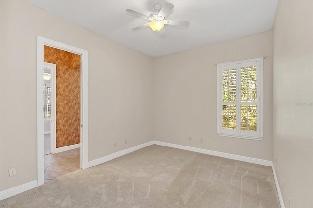1610 Conway Isle Cir, Belle Isle, FL 32809 - empty room with carpet floors and a ceiling fan