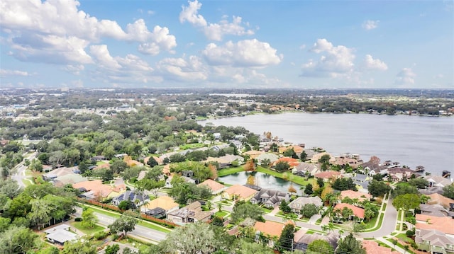 drone / aerial view featuring a water view