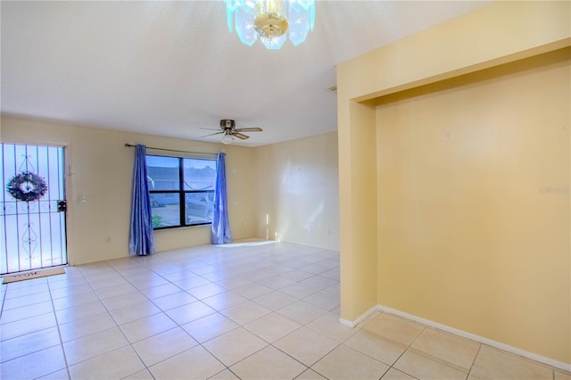 79 Lake Villa Way, Kissimmee, FL 34743 - empty room featuring light tile patterned floors and ceiling fan