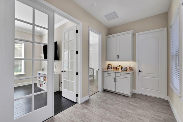 interior space featuring white cabinetry