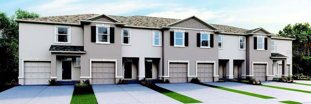 view of front of home with a garage