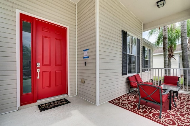 property entrance with covered porch