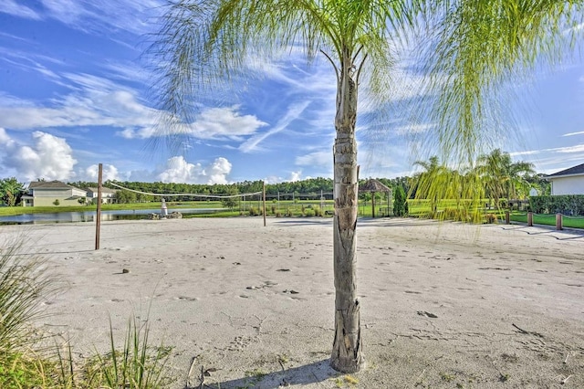 view of home's community with volleyball court