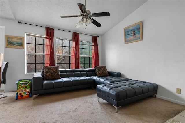 carpeted living room with a textured ceiling, ceiling fan, and lofted ceiling